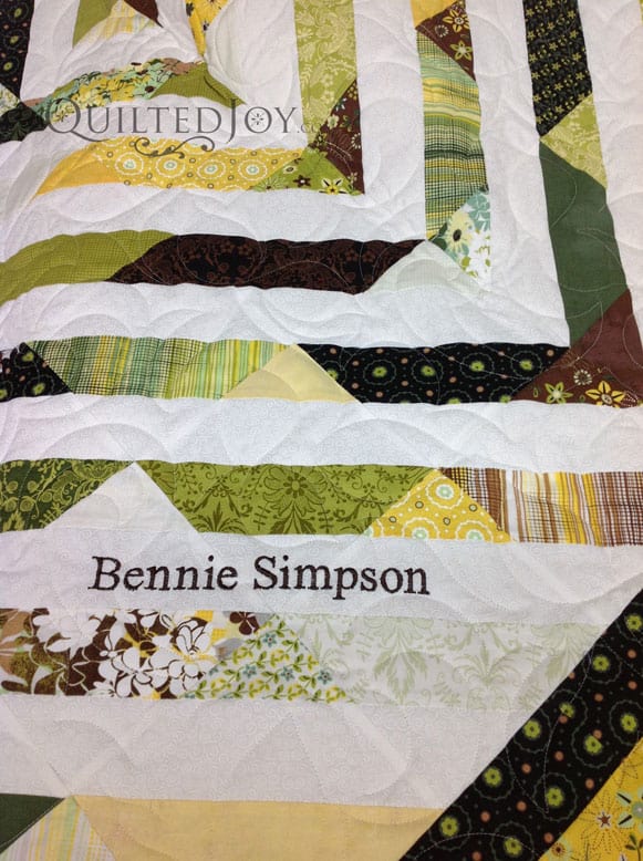 Embroidered name on quilt