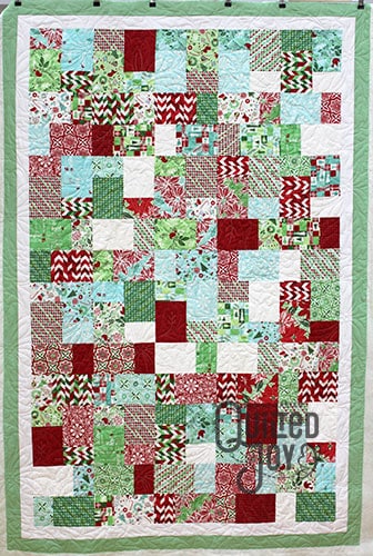 Tabatha's Modern Christmas Quilt, quilted by Angela Huffman of Quilted Joy
